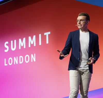 James Eastham talking at the AWS London Summit in 2024